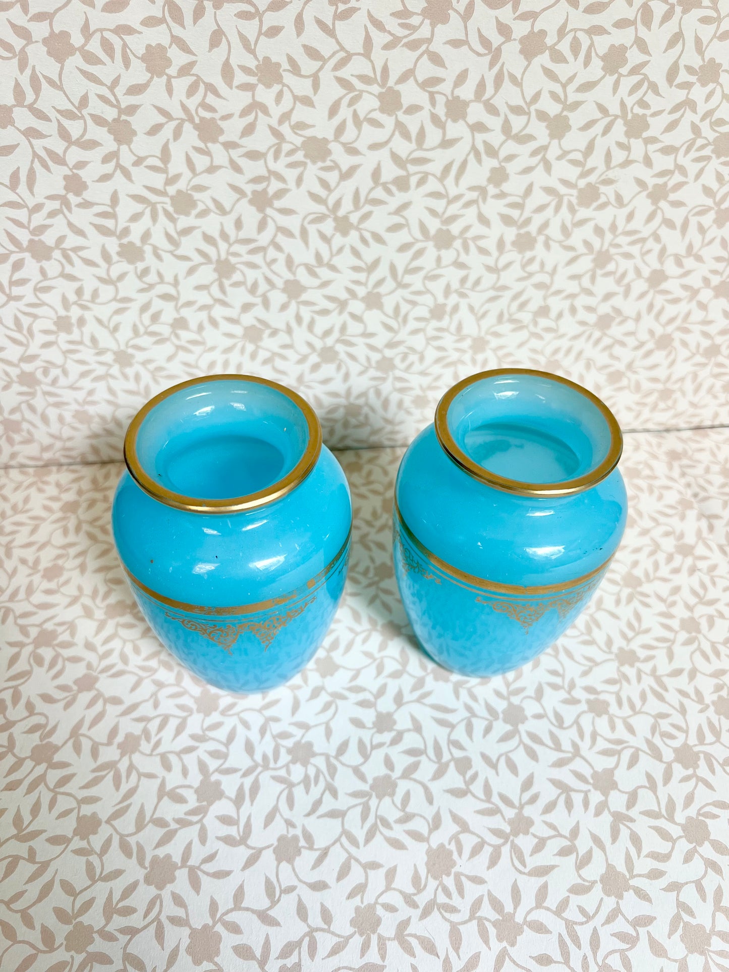 pair of Baccarat blue opaline agate bud vases with gold gilt