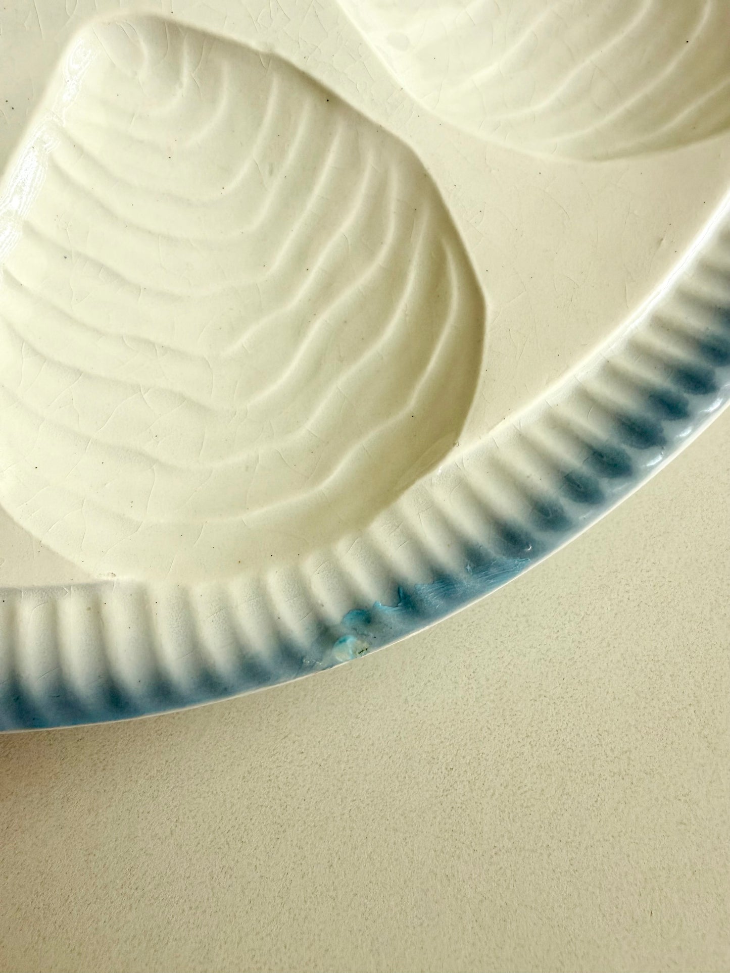 French blue and white fish-shaped oyster plate