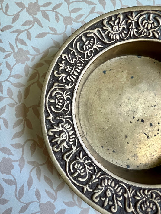 brass trinket dish with filigree detailed edge