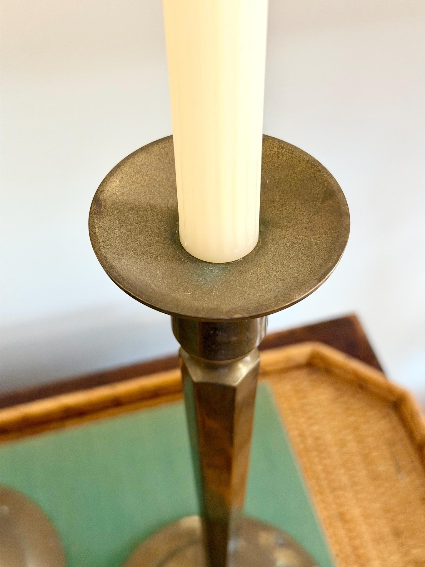 pair of tall brass arts and crafts candlesticks