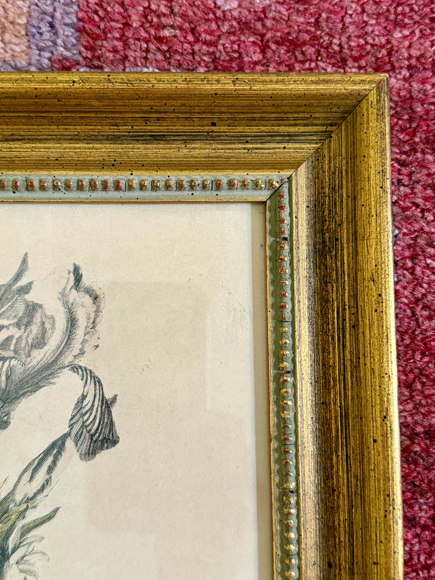 framed hand colored engraving of a floral arrangement attributed to Jean-Baptiste Monnoyer