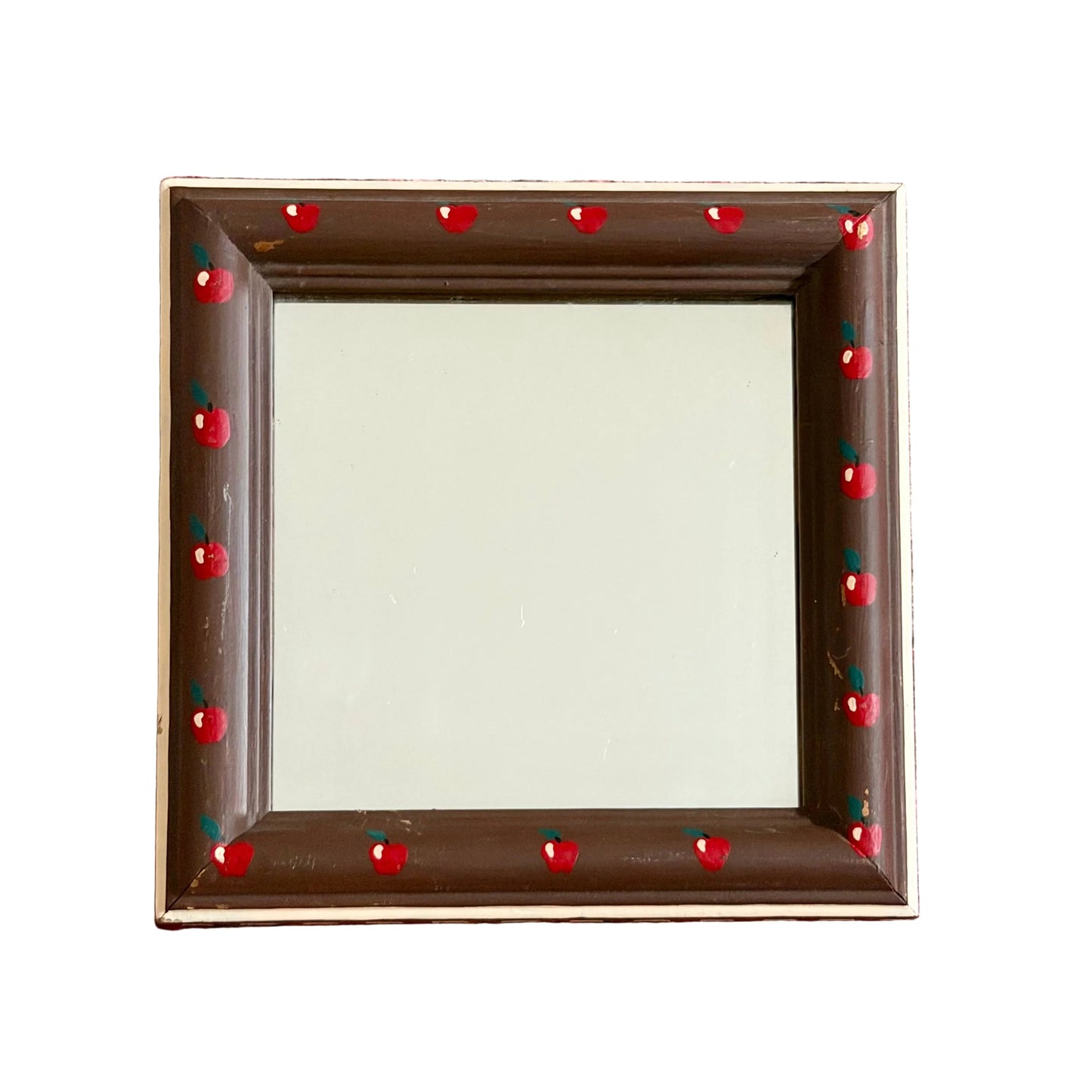 A square decorative mirror with a dark brown frame featuring small red painted accents along the border.
