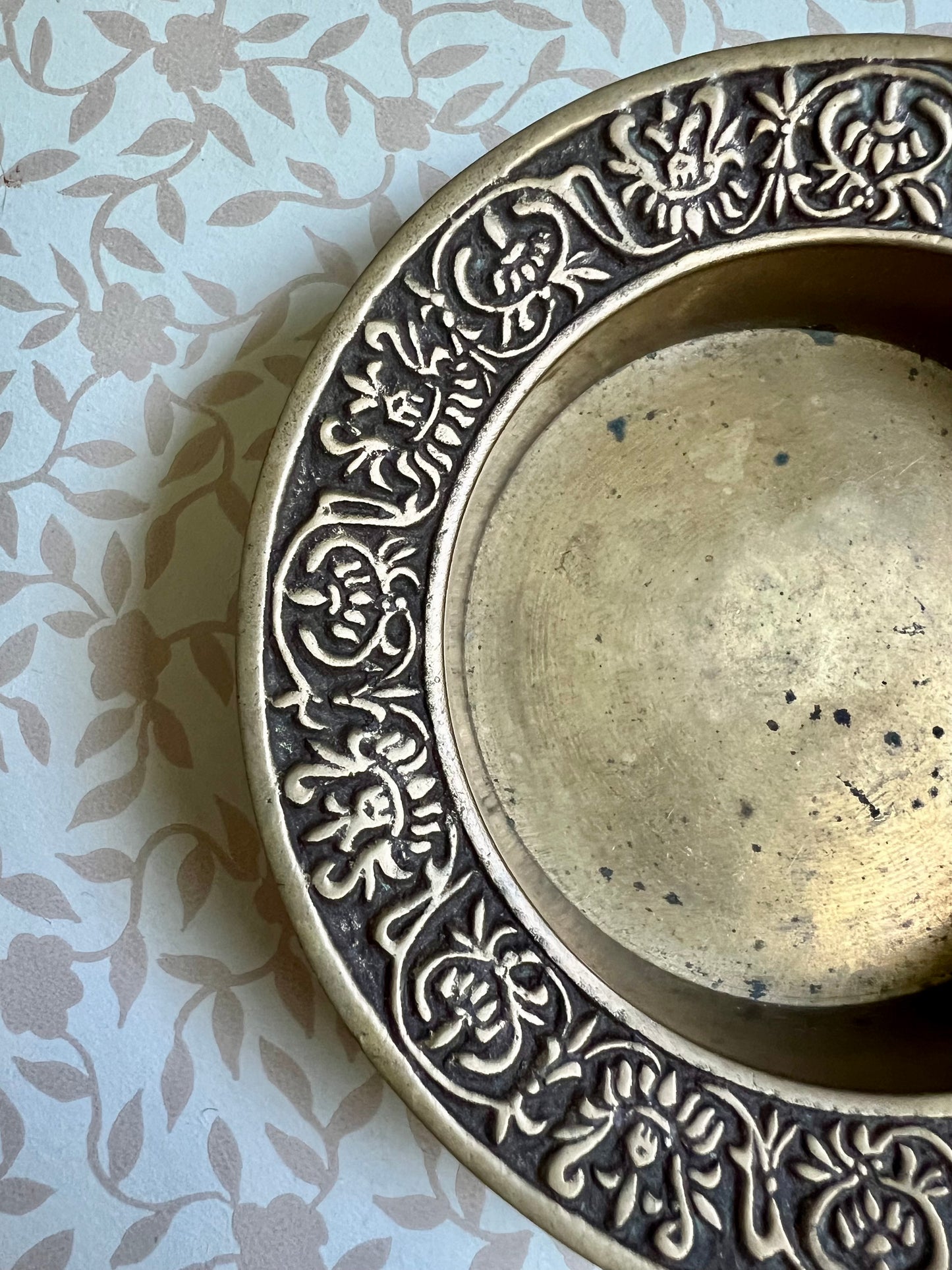 brass trinket dish with filigree detailed edge