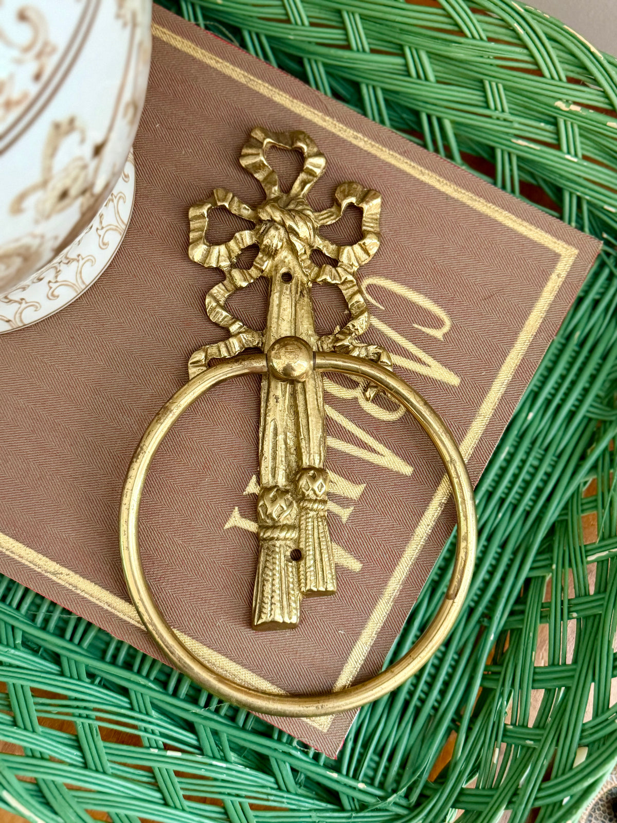 brass tassel and bow bathroom towel holder
