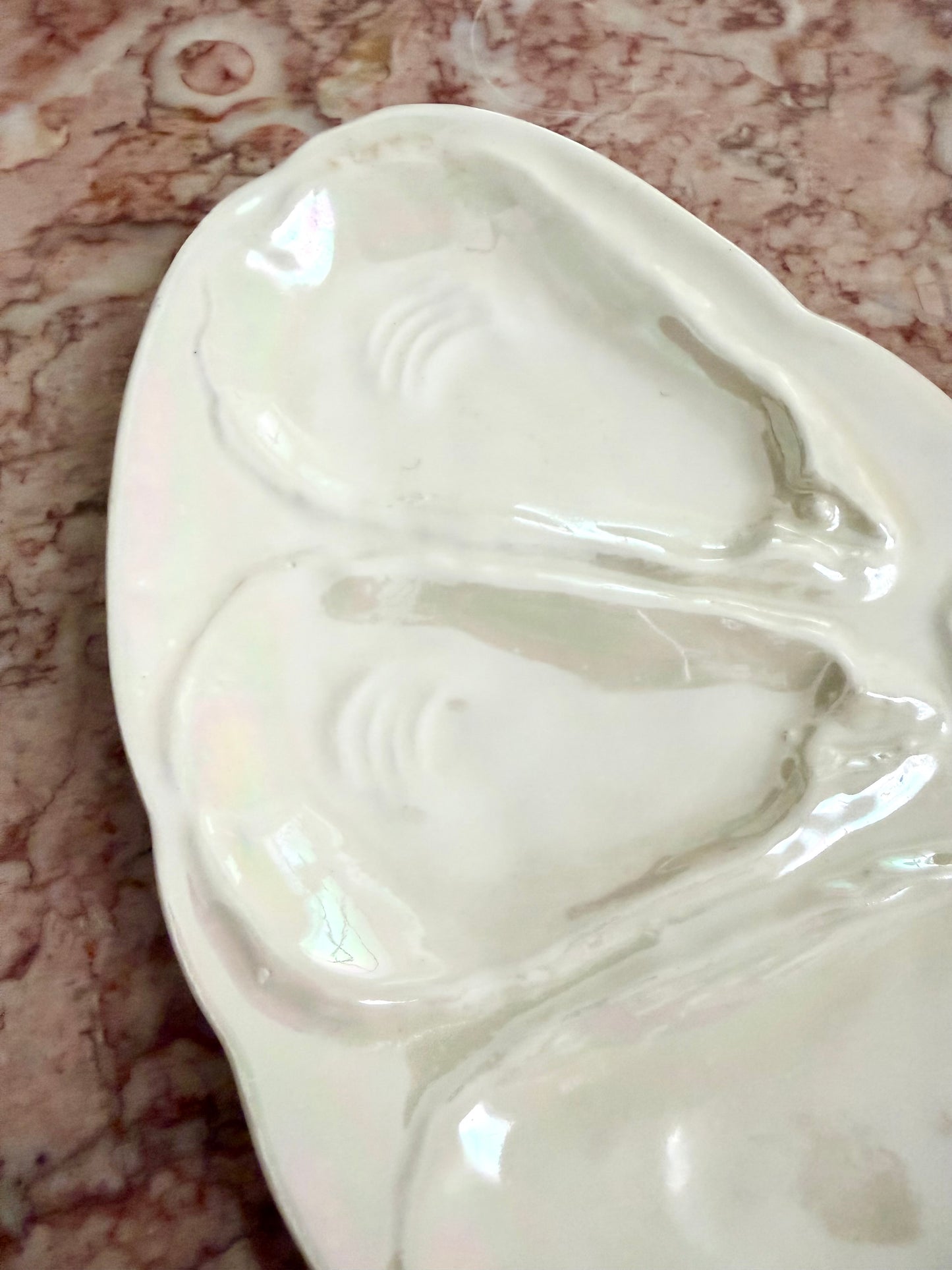 iridescent crescent-shaped oyster plate