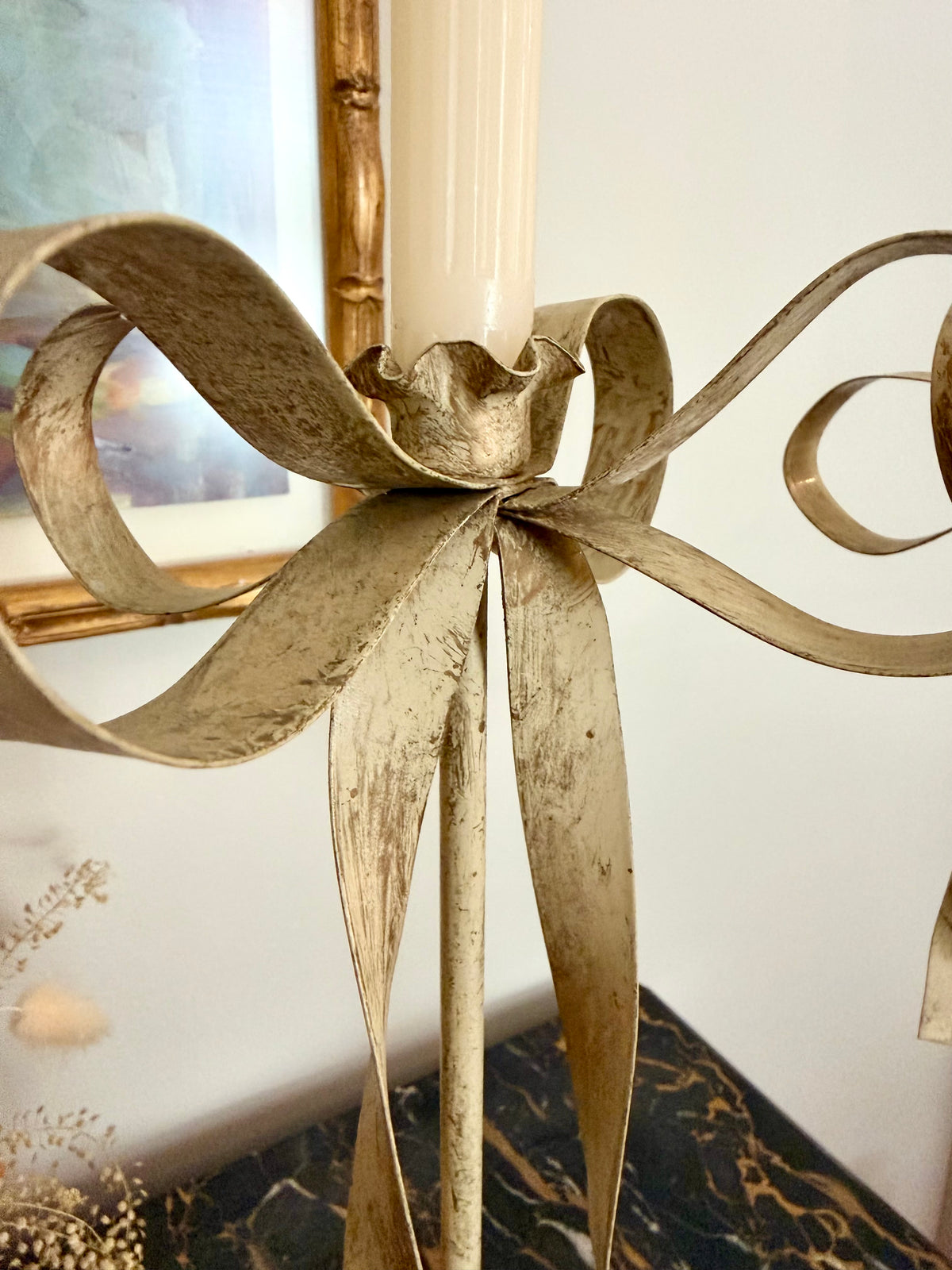 pair of cream tole ribbon candlesticks