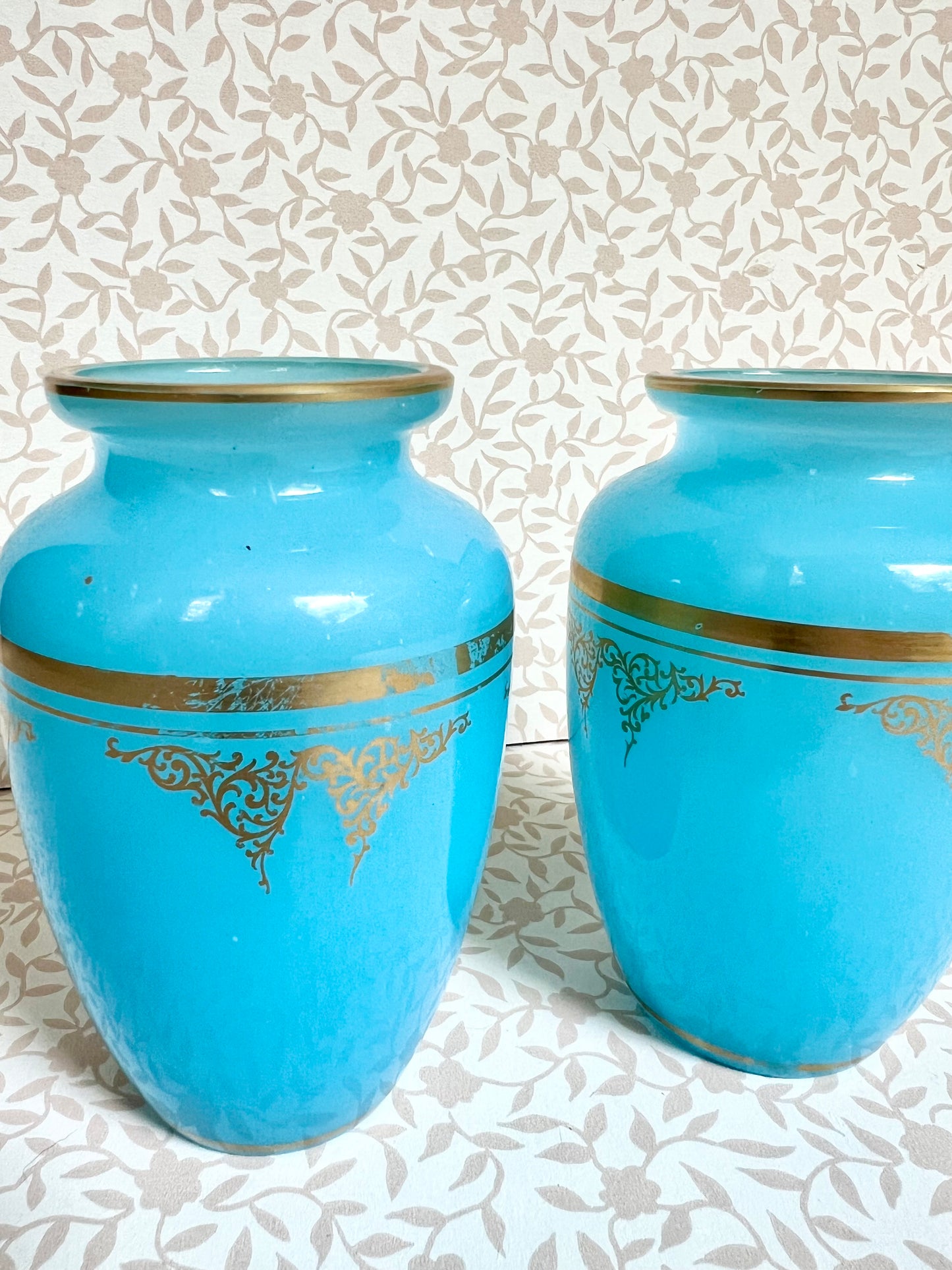 pair of Baccarat blue opaline agate bud vases with gold gilt