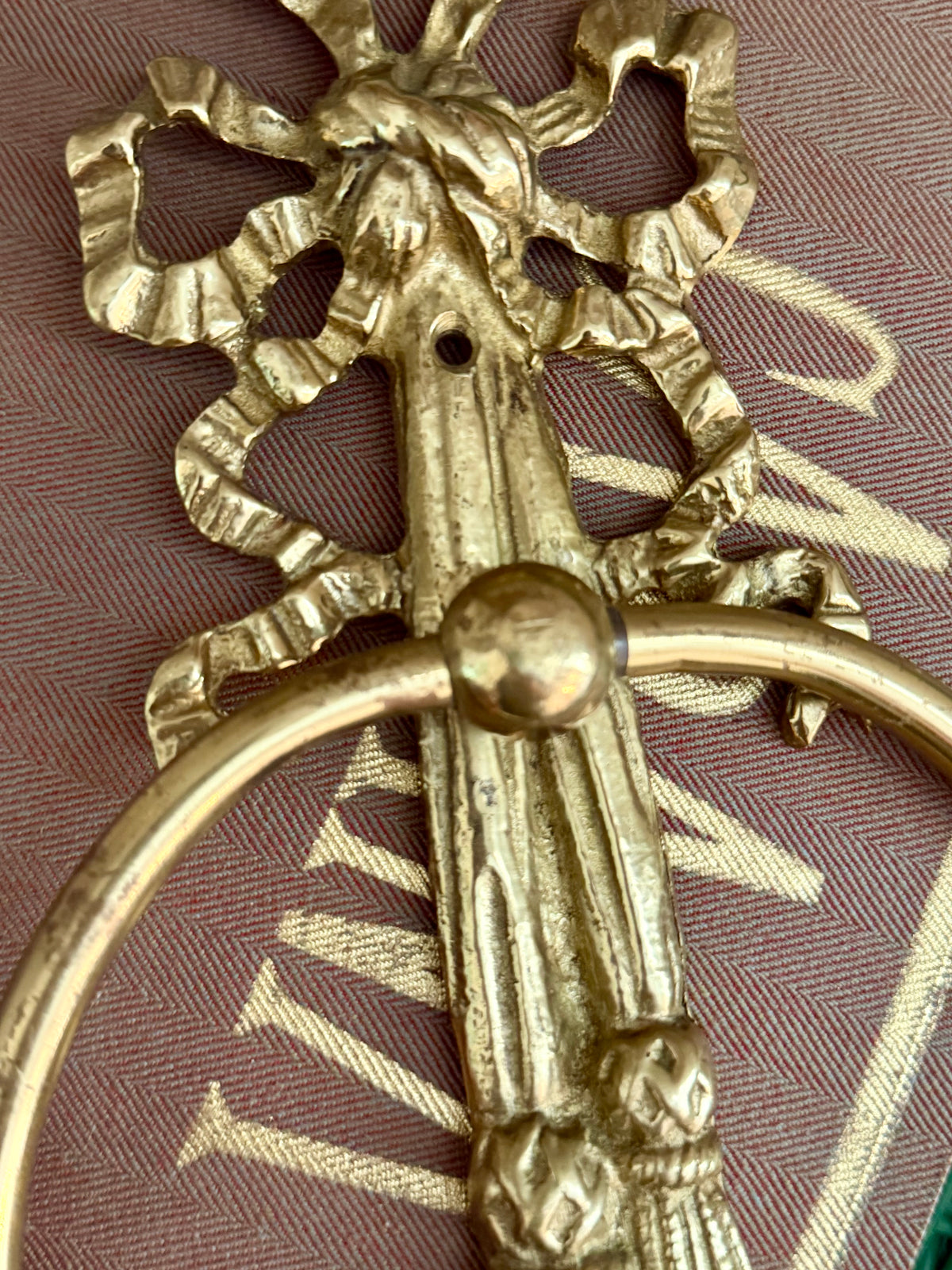 brass tassel and bow bathroom towel holder