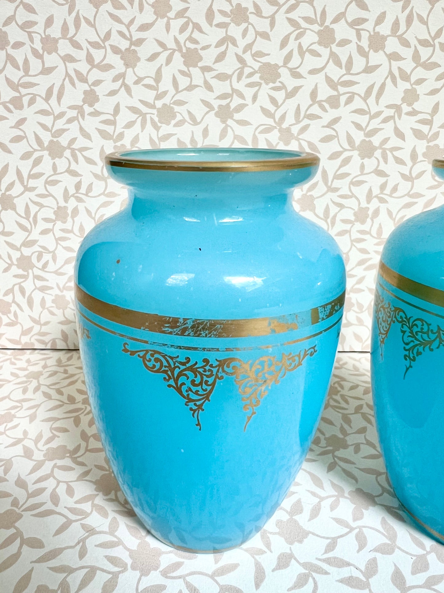 pair of Baccarat blue opaline agate bud vases with gold gilt
