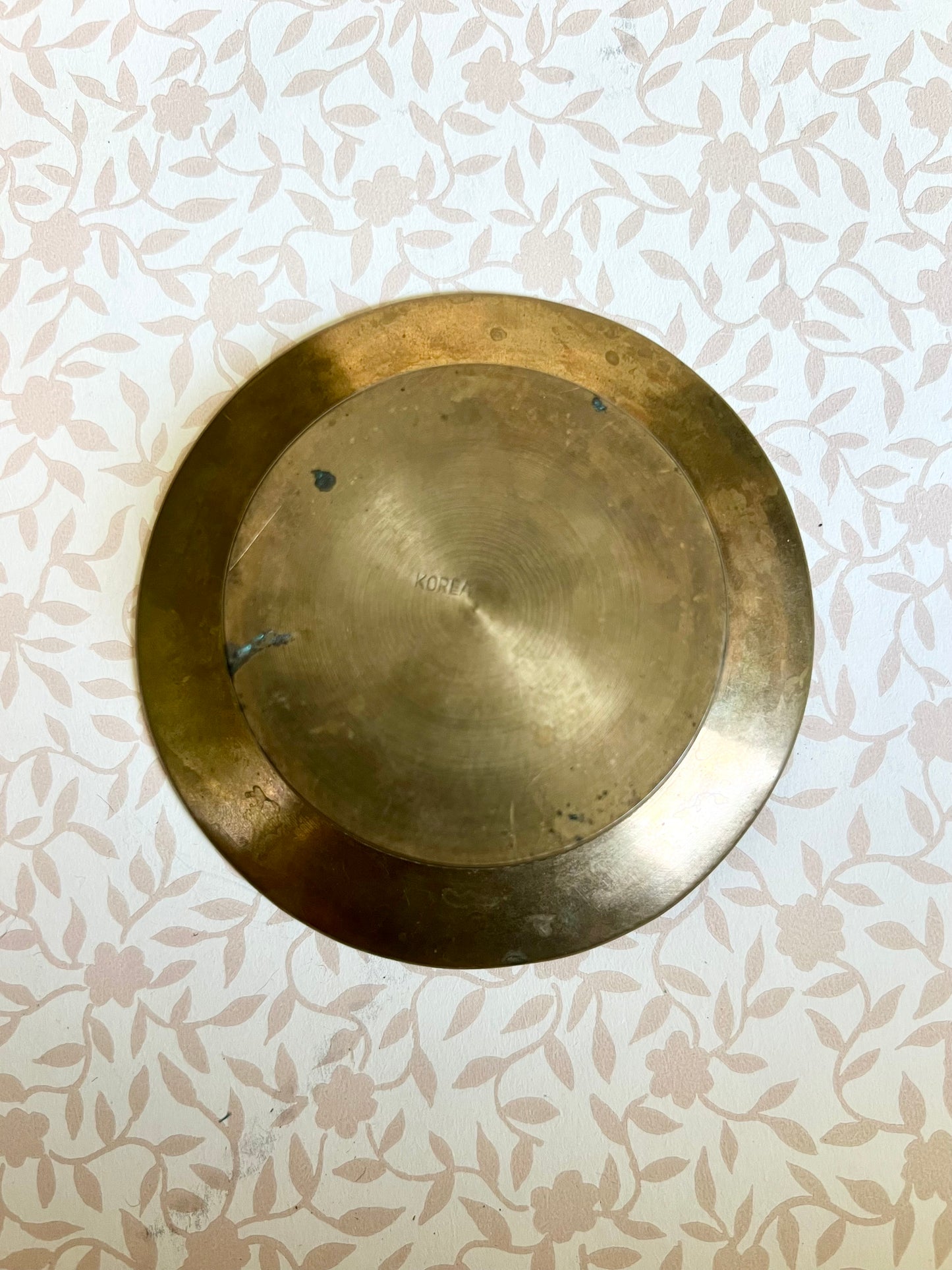 brass trinket dish with filigree detailed edge