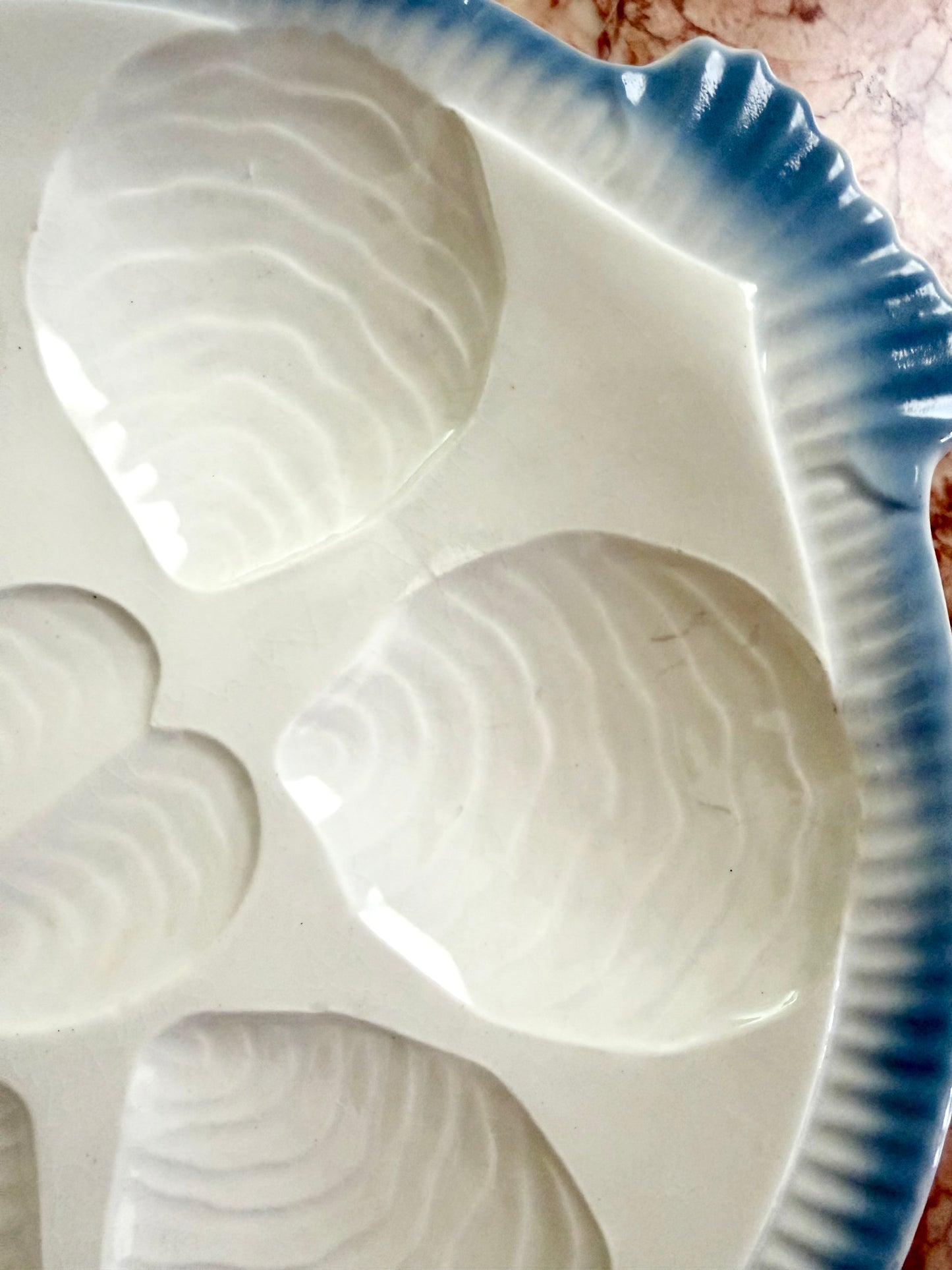 French blue and white fish-shaped oyster plate