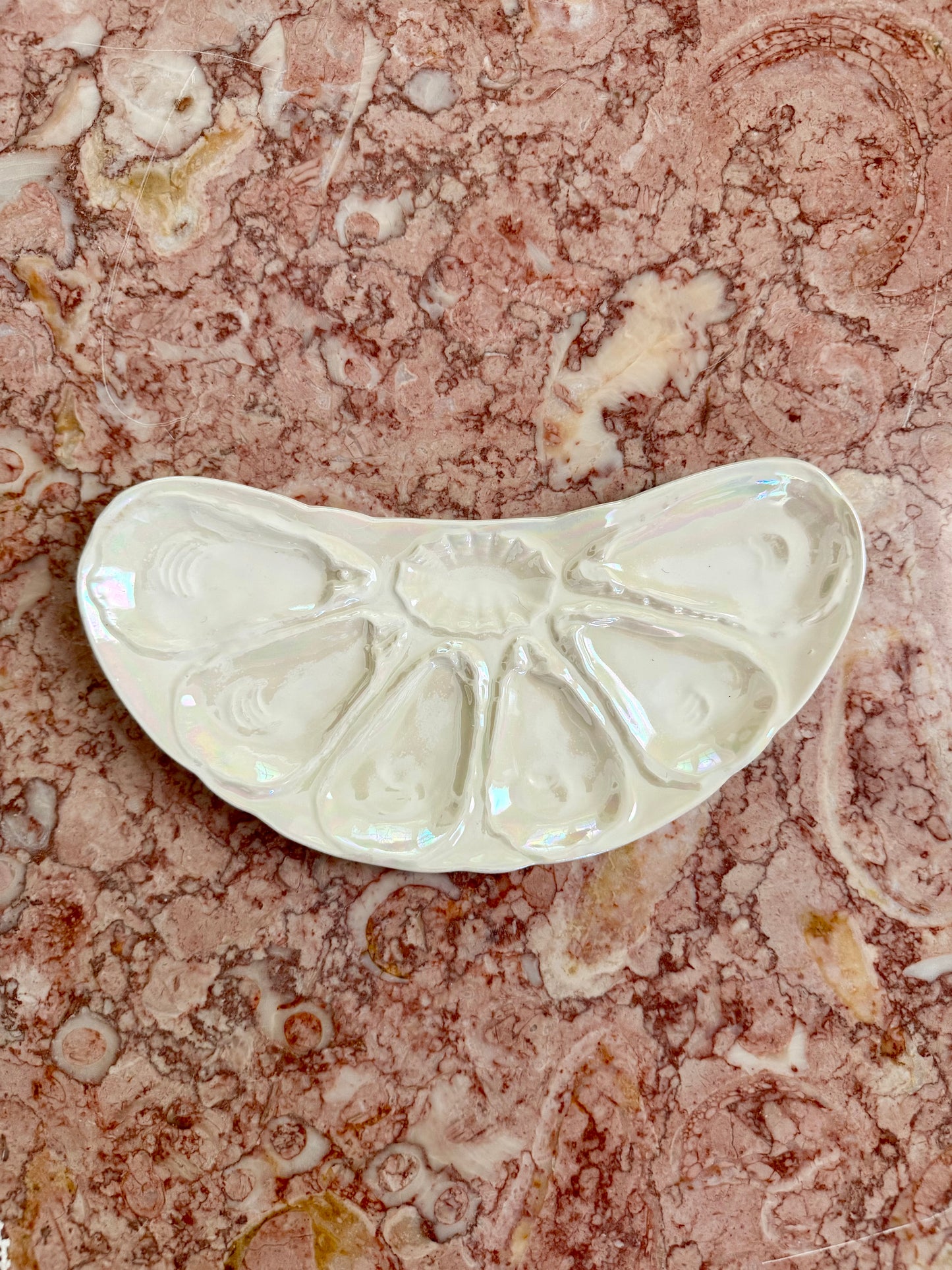 iridescent crescent-shaped oyster plate