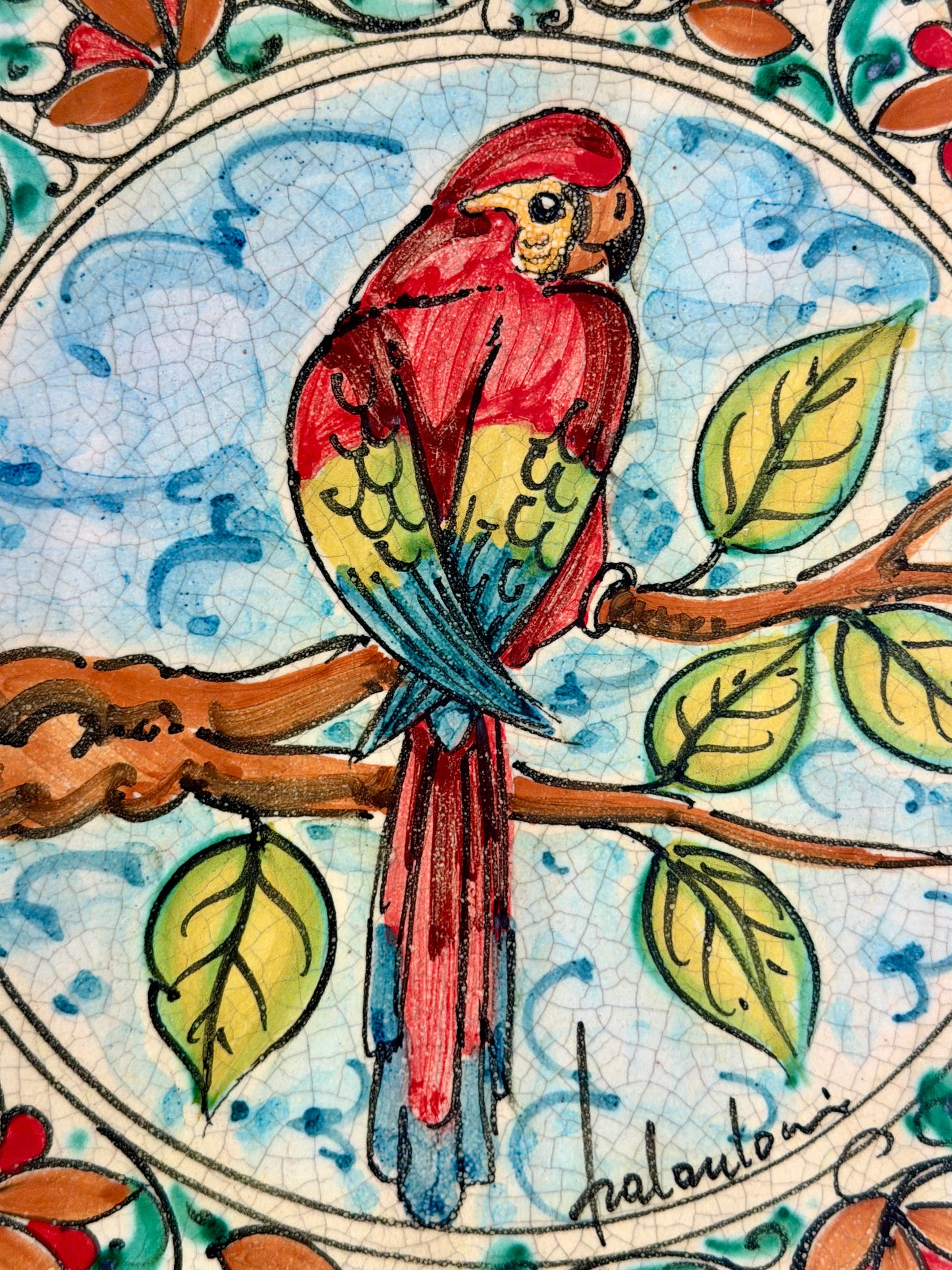 Vietri hand painted terracotta tile with red macaw bird
