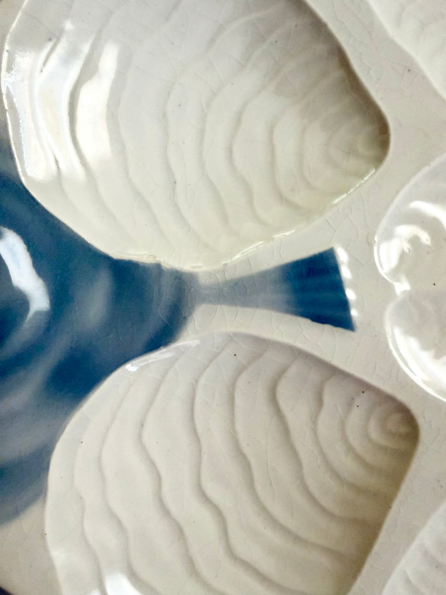 French blue and white fish-shaped oyster plate