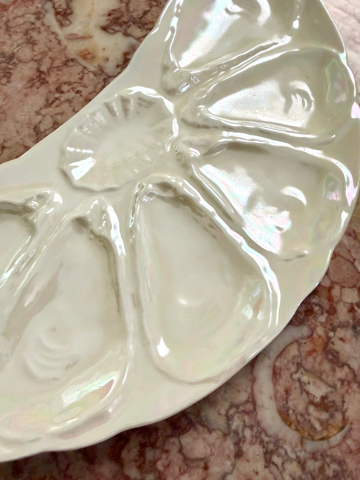 iridescent crescent-shaped oyster plate