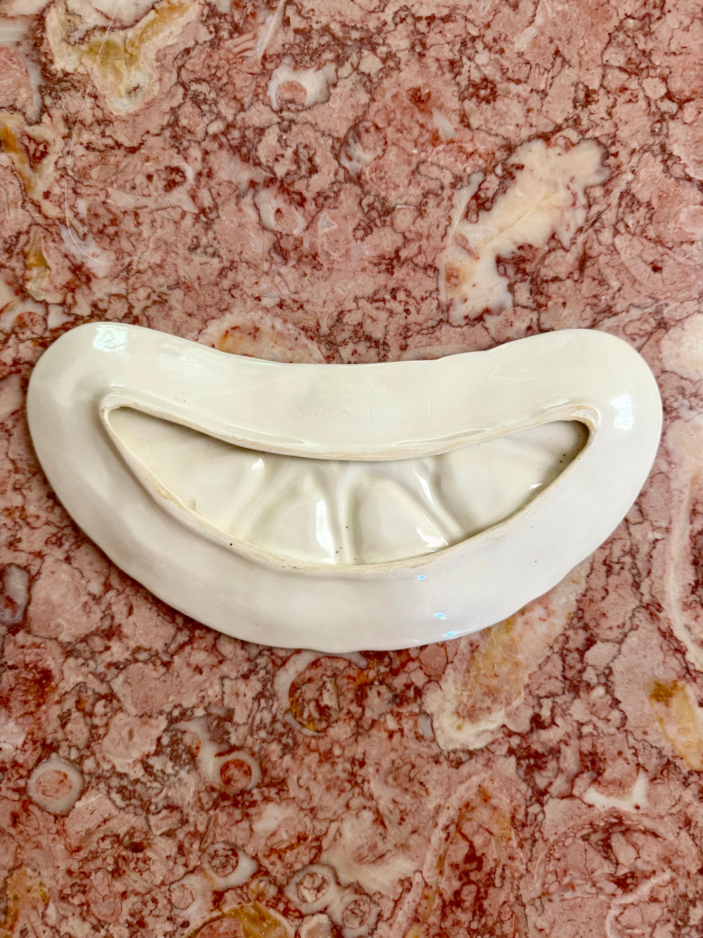 iridescent crescent-shaped oyster plate