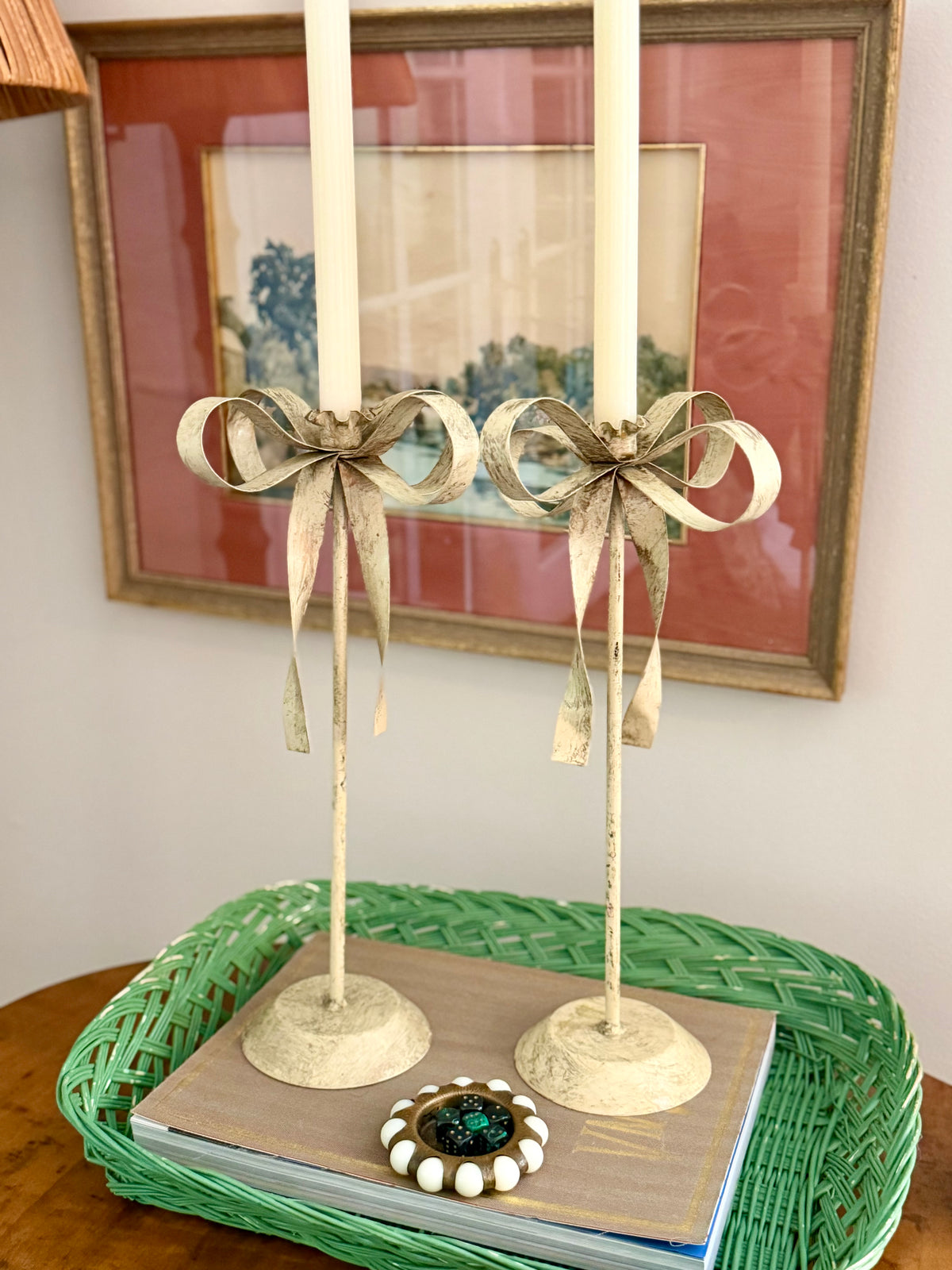 pair of cream tole ribbon candlesticks