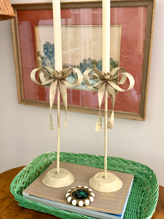 pair of cream tole ribbon candlesticks