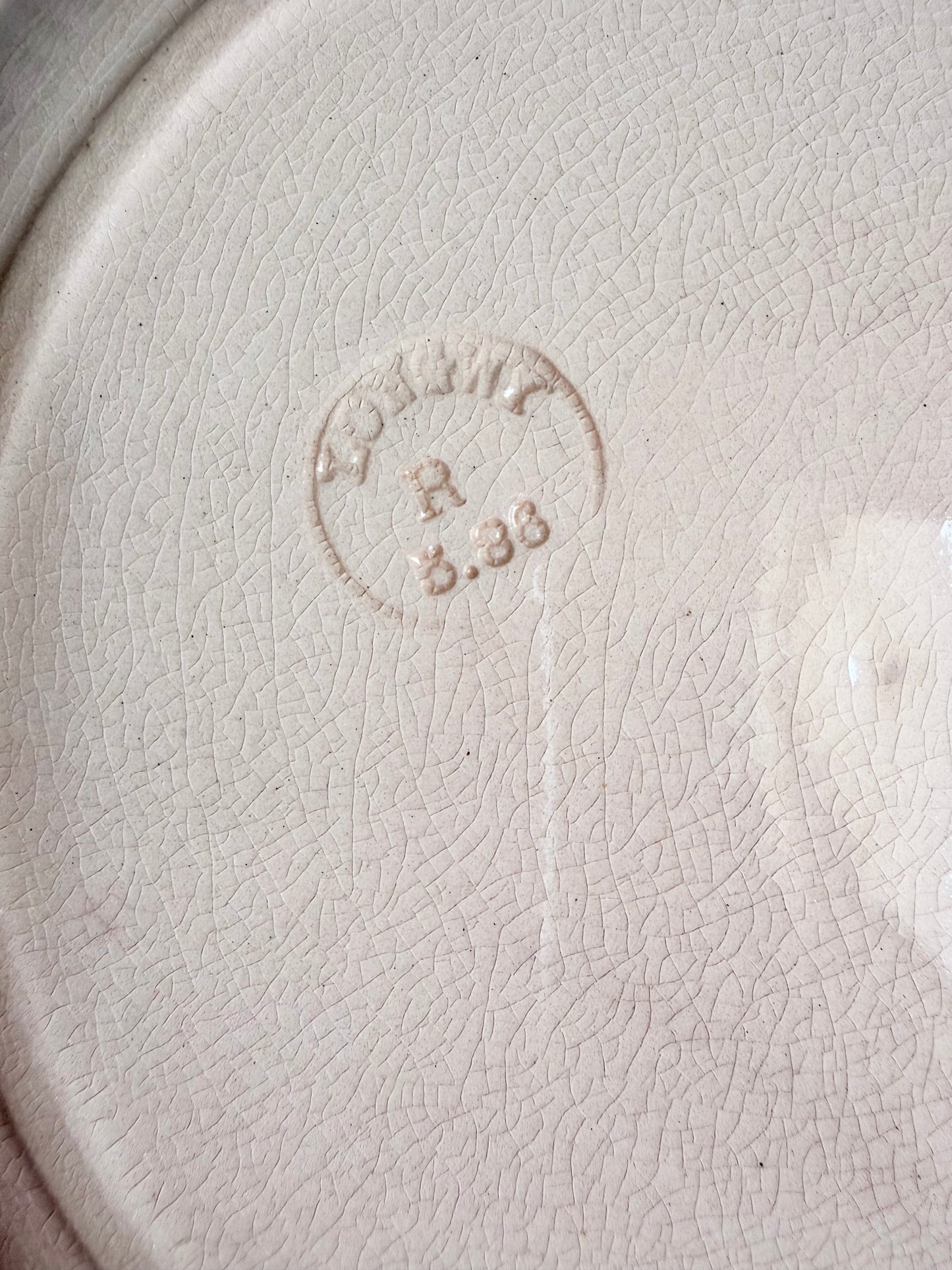 Longwy "Marly" earthenware plates with brown or blue transferware and a pierced basketweave border