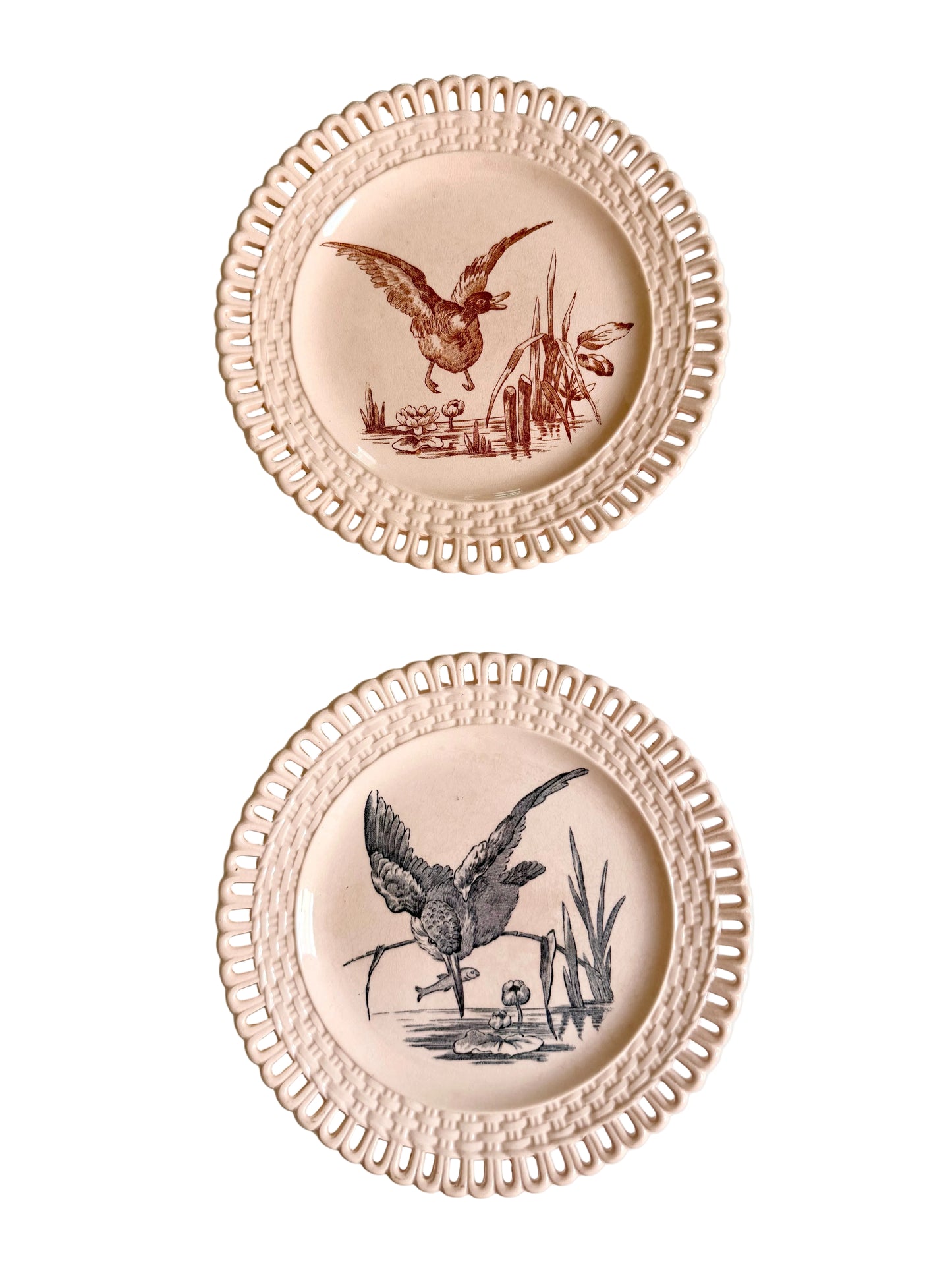 Longwy "Marly" earthenware plates with brown or blue transferware and a pierced basketweave border