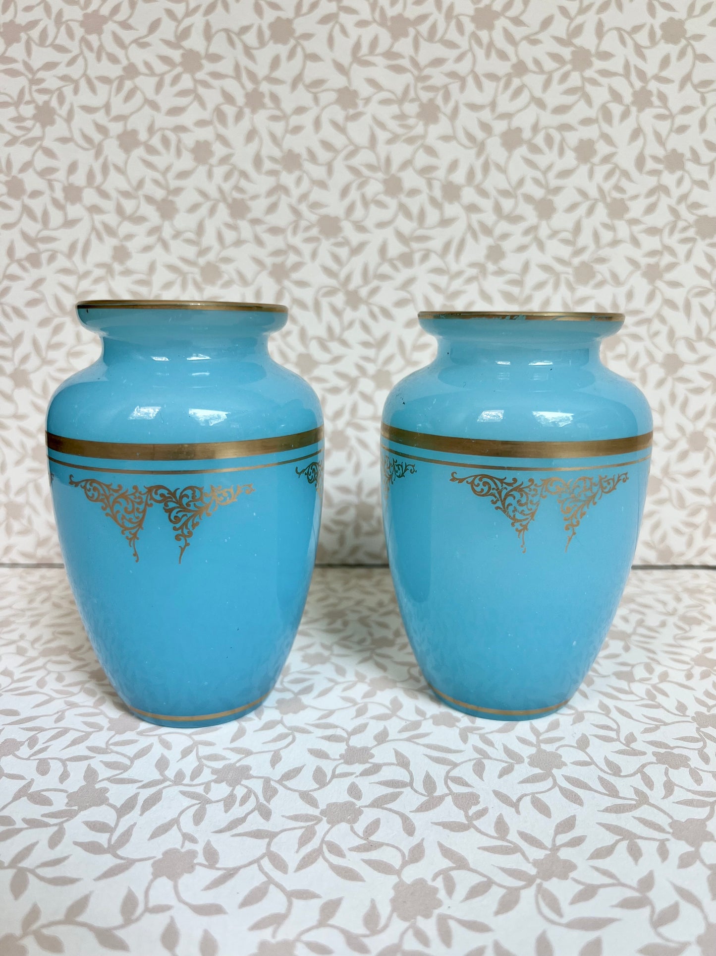 pair of Baccarat blue opaline agate bud vases with gold gilt