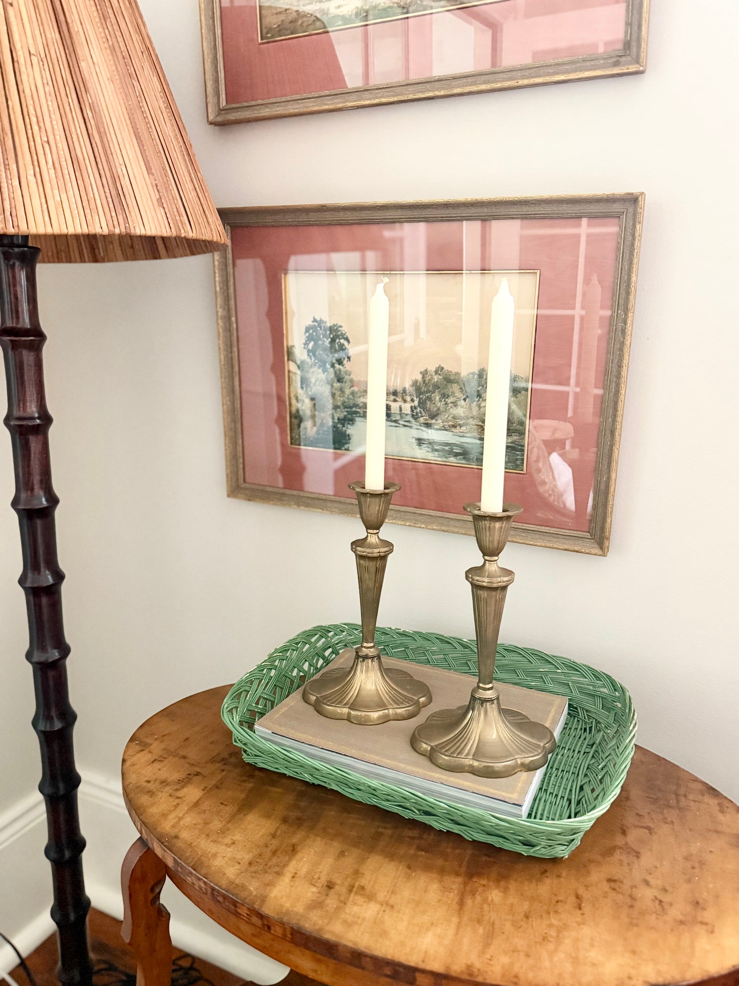 pair of brass candlesticks with a scalloped base