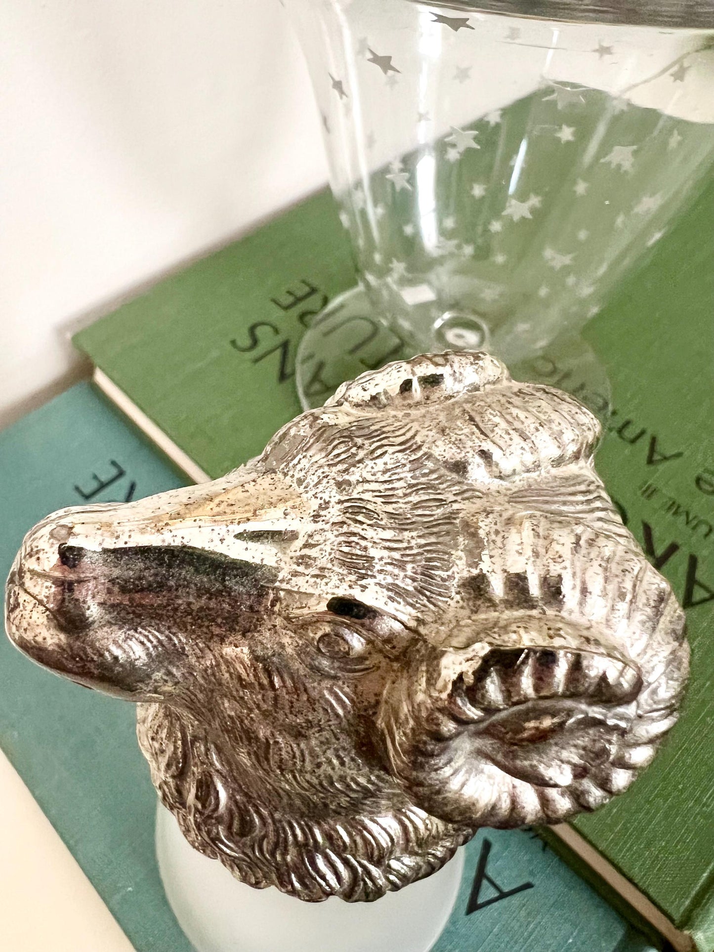 silver plate ram’s head stirrup cup with frosted glass