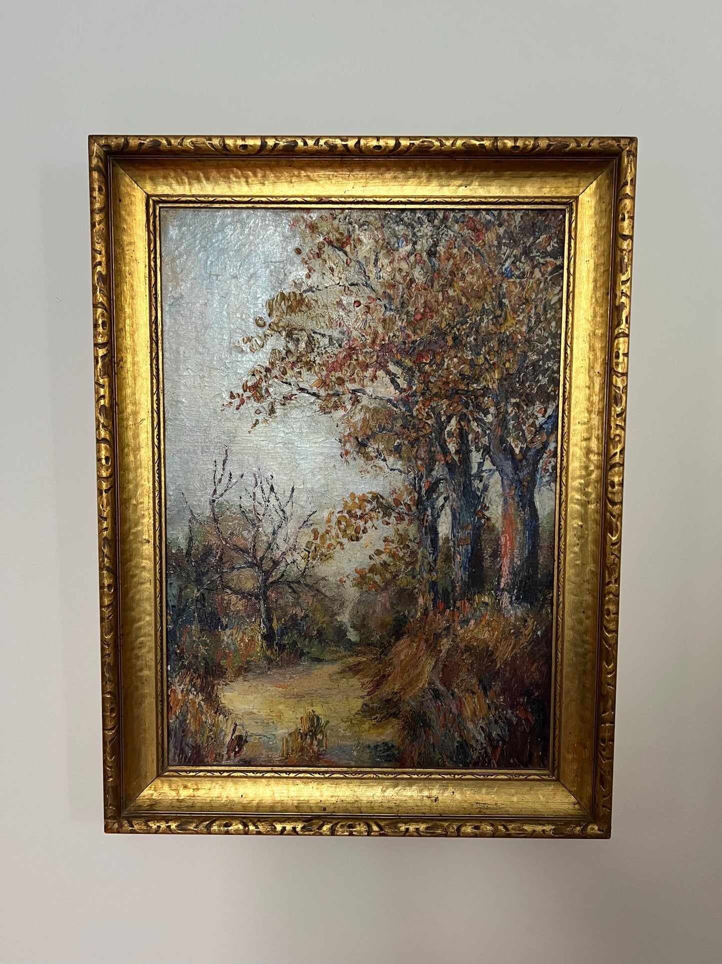 oil painting of fall trees in gold gilt frame