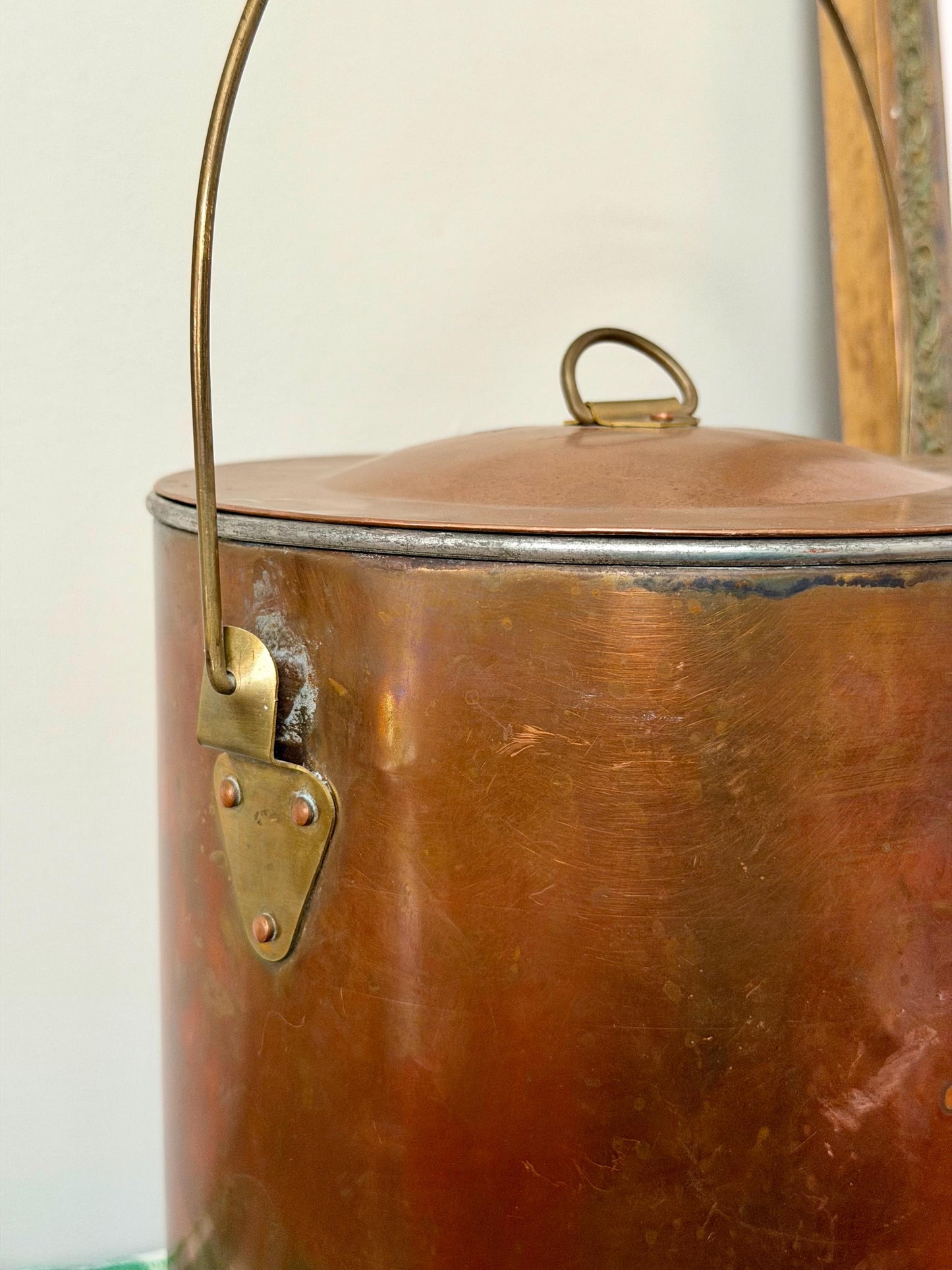 copper lidded canister with thin handle
