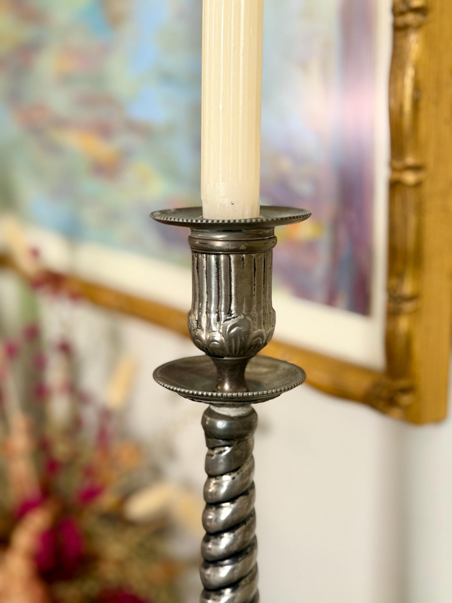 pair of silver plate ornate twisted candlesticks