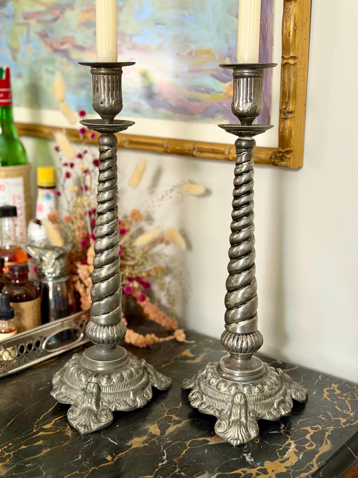 pair of silver plate ornate twisted candlesticks
