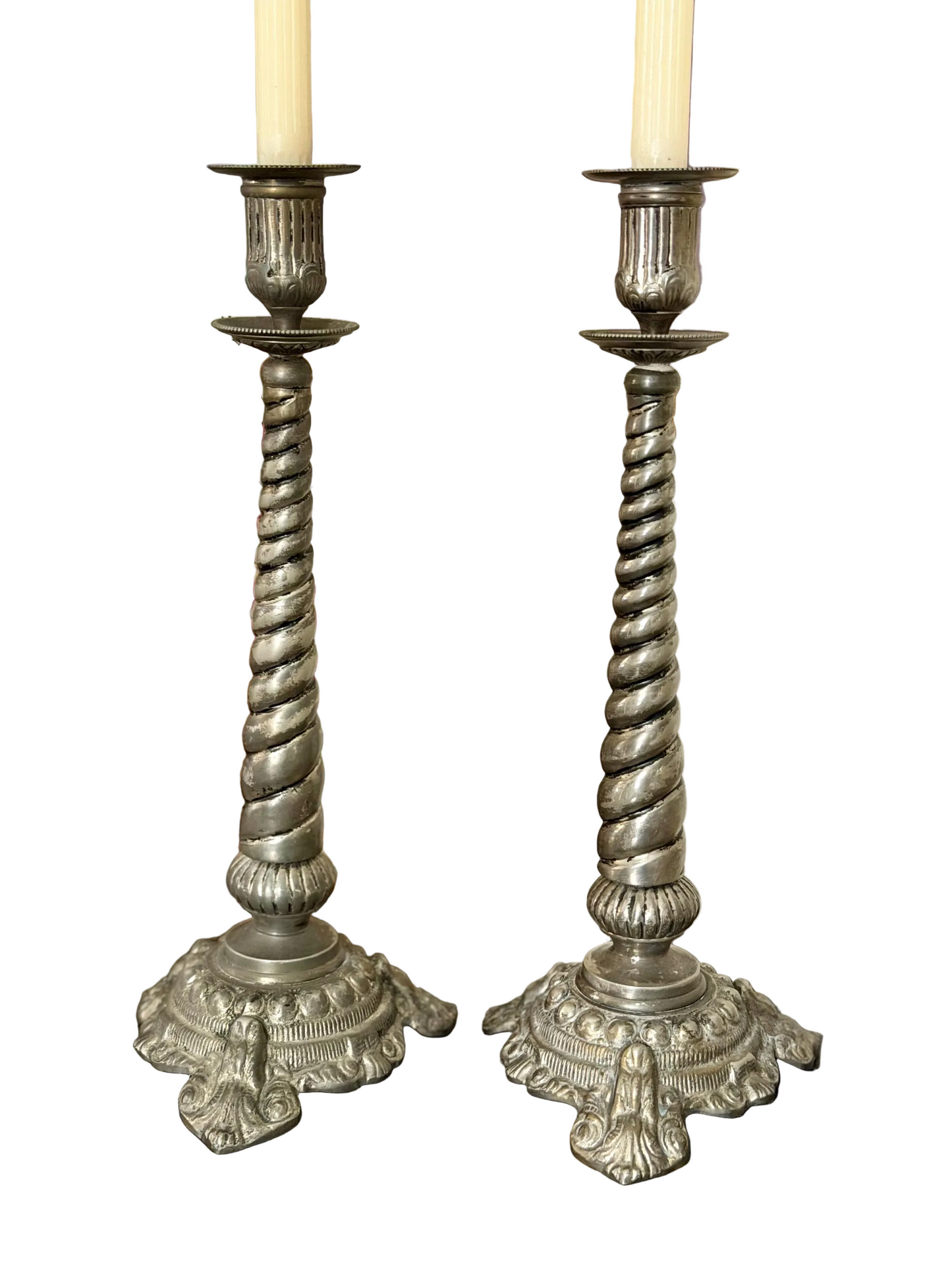 pair of silver plate ornate twisted candlesticks