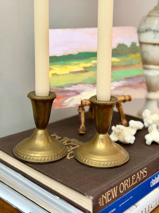 pair of short brass candlesticks