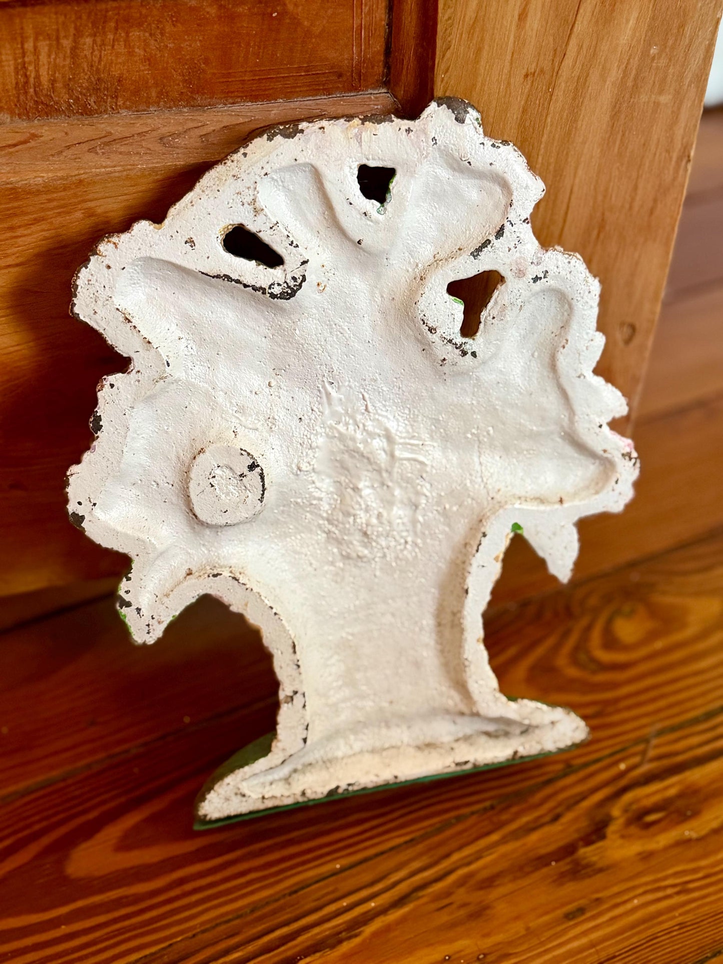 chippy cast iron bouquet door stop