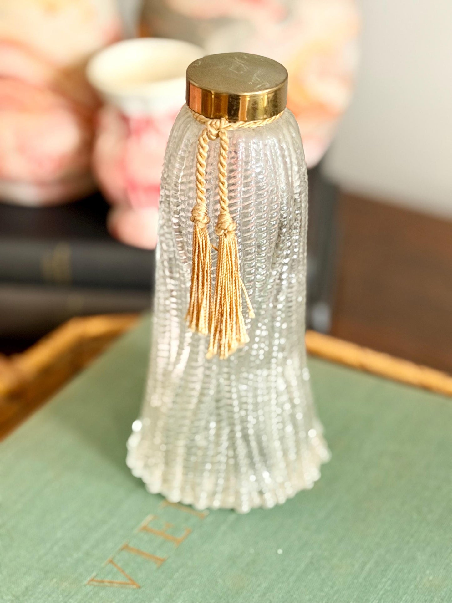 glass tassel shaped bottle