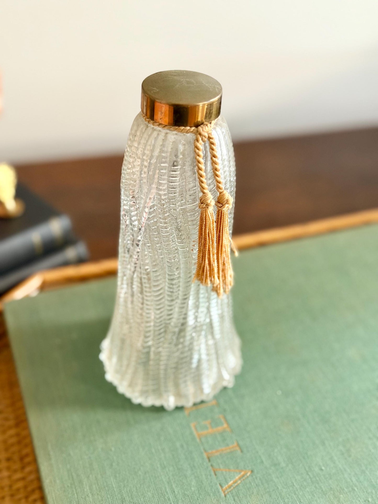 glass tassel shaped bottle