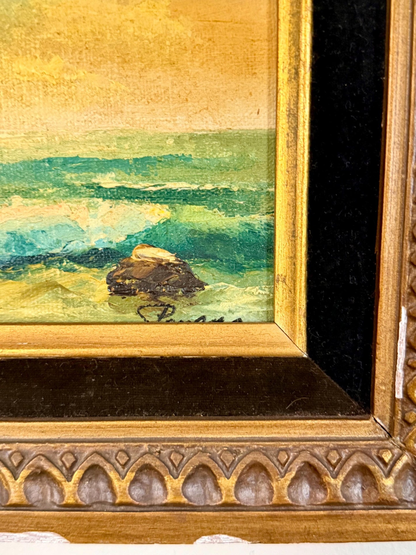 seaside oil painting in chippy wood frame with black velvet matting